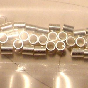 Quetschperlen Innendurchmesser 2mm Aussendurchmesser 2,5mm versilbert ca 40Stk.